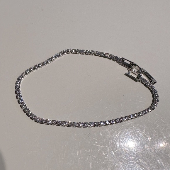 Bittersweet Silver toned Cubic Zirconia Tennis Bracelet - Picture 2 of 2